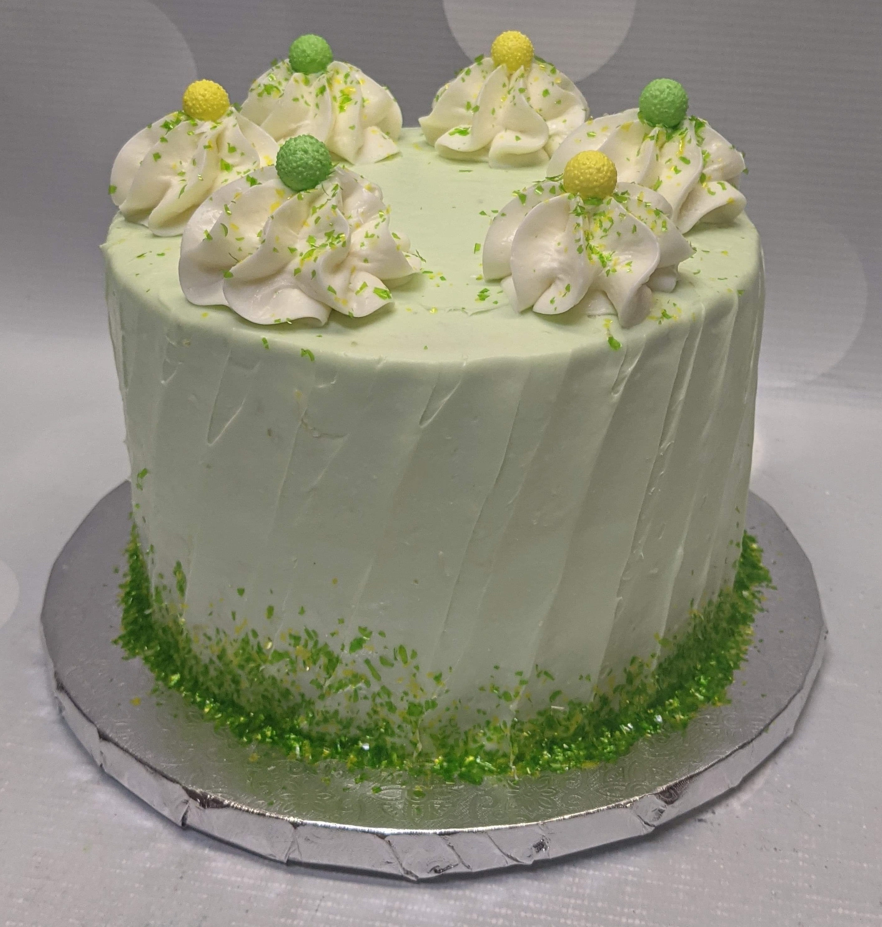 Light green drip cake - Decorated Cake by soods - CakesDecor
